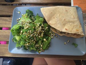 Burger with salad and sprouts at Solar Kitchen Bar in Larnaca