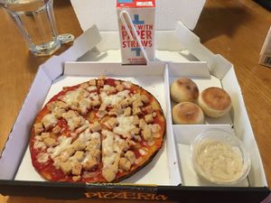 Piccolo (kid’s) menu: Quorn vegan+gf pizza, dough balls with hummus and juice at Pizza Express - Golden Cross in Oxford