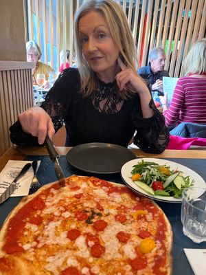 Vegan American hot pizza and mixed side salad at Pizza Express in Salford