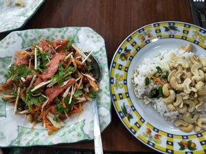 Meat salad on the left and fried cashews with a side of rice to right at Soe Pyi Swar Vegetarian Centre 斋全素食餐室 in Yangon