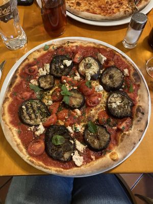 Aubergine, tomato, tofu, mint & pommegranite cream vegan pizza 😍  at Pizza Crocodiles in Innsbruck