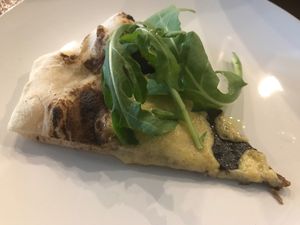 Black truffle and garlic pizza with hemp havarti cheese. So so good and must order this one!!! :)  at Die Pie in Edmonton