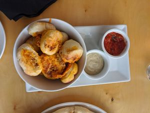 Cheese balls with marinara and pickle aoli at Die Pie in Edmonton