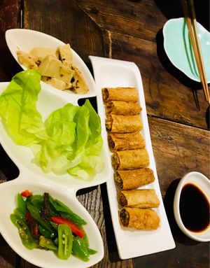 Left: soy chicken lettuce wrap Right: bean curd spring rolls   at Wu Guan Tang Su Shi in Shanghai