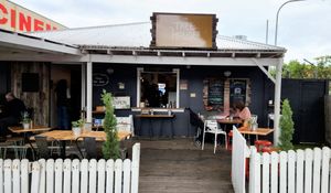 Exterior and outdoor eating area at The Treehouse Cafe in Ulladulla