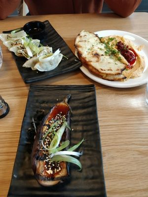 Miso glazed aubergine, gyoza, flat bread and houmous - all vegan at Mildreds - Dalston in East London