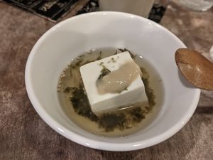 Tofu with miso, in a soup at Tofu Room Dy's in Tokyo