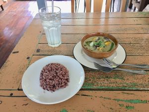 Green curry with brown rice and lime soda at Bird's Nest Cafe in Chiang Mai