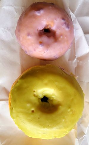 Blueberry cake donut (top) matcha raised donut (bottom) at Vegan Donut Gelato in Oakland