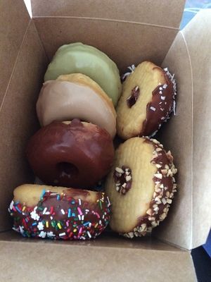Green tea, maple, chocolate, chocolate and coconut, chocolate and peanuts, chocolate and sprinkles 
 at Vegan Donut Gelato in Oakland
