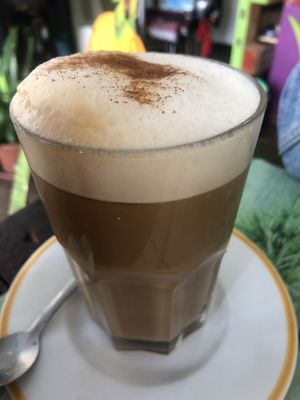 Galao (Espresso with lots of milk) and some cinnamon on top at Veggie Momi in Albufeira