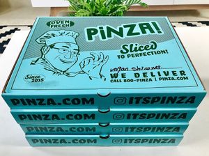 The stack of stylish looking pizzas  at PINZA - Jumeirah Village Circle in Dubai