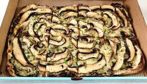 Truffle pizza  at PINZA - Jumeirah Village Circle in Dubai