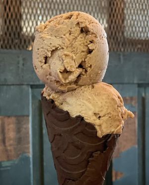 Cinnamon Toast Crunch ice cream in a chocolate waffle cone 😃  at On The Bus in Milwaukee