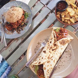 Jack&Roll wrap, Jackpot burger and potato wedges with thai sauce. at The Burger Cafe in Tenerife