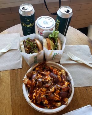 Special edition Freedom Fries, Chicken Bacon Ranch Sandwich, American Burger with pepperjack and house sauce, chocolate shake, and two ciders. at Next Level Burger - Roosevelt in Seattle