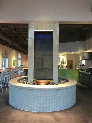 A water wall provides the sound of falling water. at InWave Restaurant & Juice Bar in Louisville