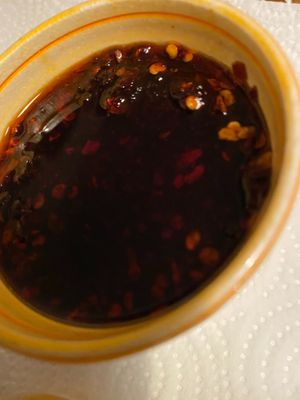 They now do a garlic and chilli oil dip at New Happy Palace  in Gillingham