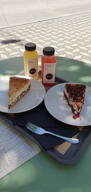 Pieces of cakes and fresh juices at Barbarella Juicebar in Ljubljana