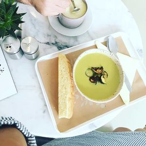 Creamy zucchini soup with pesto at Barbarella Juicebar in Ljubljana