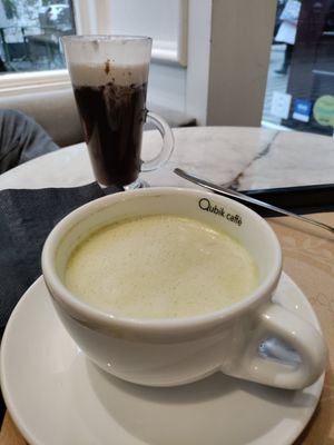 Matcha and thick hot chocolate with cream at Barbarella Juicebar in Ljubljana