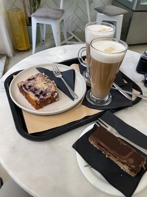 Blueberry and lemon loaf, twix slice, dirty chai lattes  at Barbarella Juicebar in Ljubljana