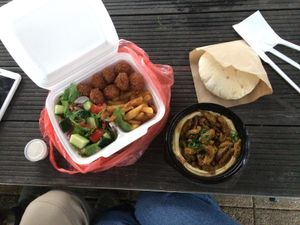 Vegan menu for two - salad, fries, falafels, homemade bread and hummus with shawarma on top. Delicious taste but small portion for two (i could eat this on my own easily).  at  Paprika in Prague