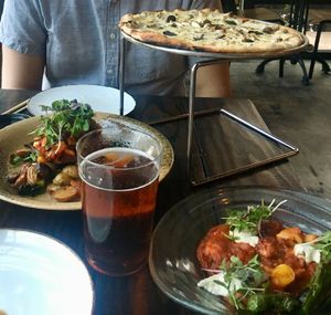 Eggplant medallion, mushroom truffle pizza, and gnocchi at Soul Tavern in Miami Beach