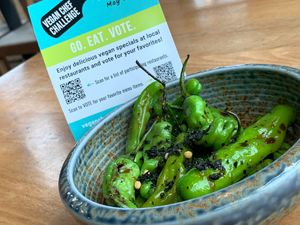 Grilled Shishito Peppers with Vegan Nori Furikake, Microgreens and Lemon Juice tossed in a Teriyaki Sauce.  Kalamazoo Vegan Chef Challenge (May 2024) at Maru Sushi in Kalamazoo