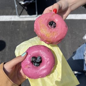 blueberry donut and blackberry + raspberry donutt  at Devi's Donuts and Sweets in Long Beach