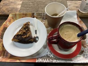 Torta de crema de maní y chocolate (una delicia!!) acompañado de un café con leche de almendras.  at Rincón Natural in Montevideo