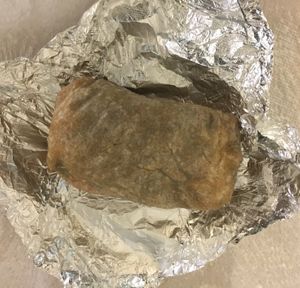 Takeout burrito. at Burritos y Mas in New York City