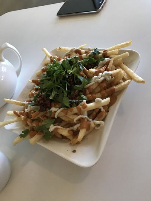 Mex Fries with ranch, chipotle, pico, "carne" crumbles, and cilantro. at Loving Hut in Upland