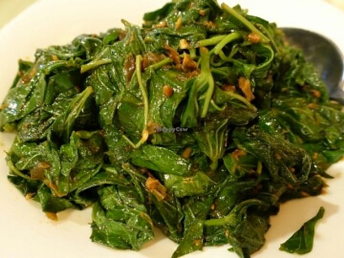 fried sweet potatoes leaves  at Classic Lao Di Fang Vegetarian Restaurant in Central Singapore