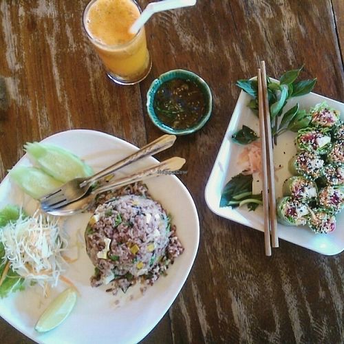Fresh springrolls, curryrice and passionfruit-carrot juice  at Aum in Chiang Mai