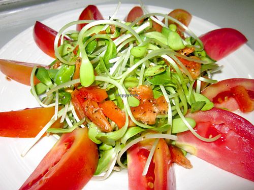 Tomato salad with sunflower sprouts and original balsamic dressind at Five Star J Restaurant in Pattaya