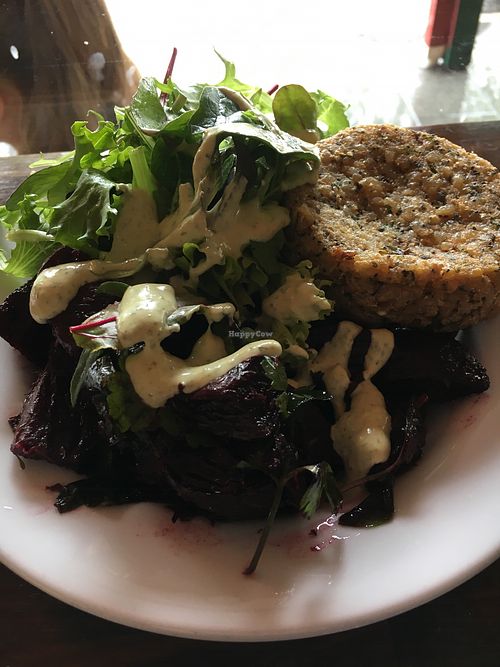 Fritter with salads at Iku Wholefood Kitchen in Glebe