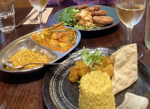 Quinoa croquettes with kimchi, steamed green veg and wasabi sauce; Malaysian curry with dhal and pear chutneyy  at Shakahari in Carlton