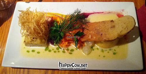 Cheddar Gorge: Twice baked cheddar souffle, loaded with a boozy ouzy cider sauce. at Terre a Terre in Brighton