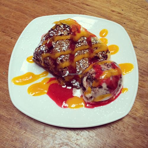 Mango & raspberry sponge cake with caramel ice cream. All vegan! Hot and cold - my favourite. at Alley Cafe Bar in Nottingham