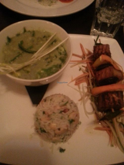 Thai green curry with tofu skewers, salad, cashew rice at Manna London Restaurant - Maybe closed in North West London