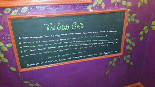 A sign on the way up the stairs. at The Egg Cafe in Liverpool