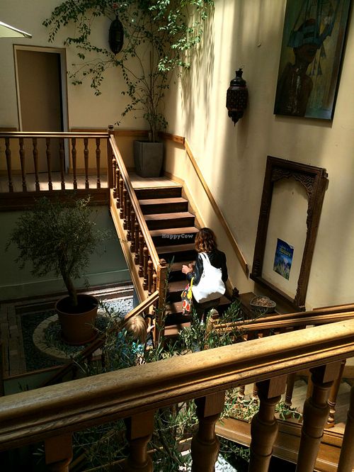Stairs going to the restaurant on the upper level at Country Life in Marseille
