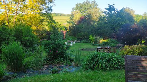 Garden overlooking the hills at La Maison du Vert in Ticheville