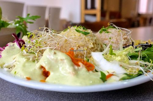 Dish served in the restaurant: two cereals, one legume, pickels, vegetables at Grand Appetit in Paris