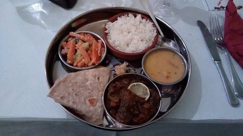 Vegan thali: rice, eggplant, chapati, vegetables at Manger Autrement in Toulouse