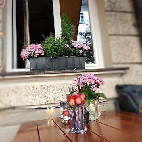 Lavender cordial with soda and fresh strawberries at Ignaz in Munich