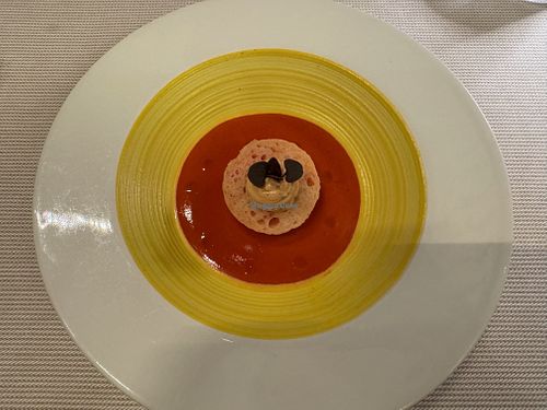 "Brother Sun" — Tomato-strawberry gazpacho, Sicilian "cunzato" bread with capers and wild fennel, plant-based saffron crescenza at Joia Alta Cucina Naturale in Milan
