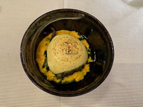 "Anima Mundi" - Risotto with carrot cream, charred asparagus, wild garlic emulsion, and a soft curry mousse at Joia Alta Cucina Naturale in Milan