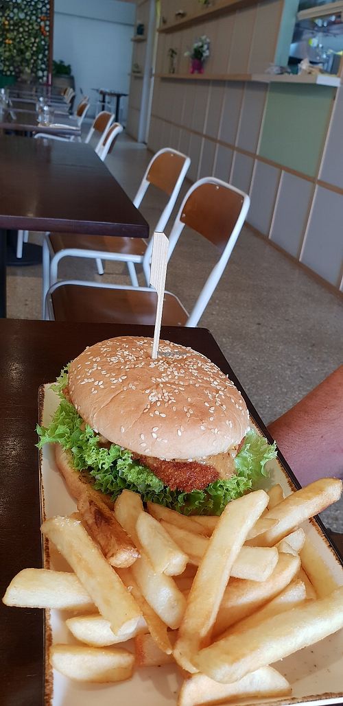 Chic burger with chips at Oh My Greens in Melton South